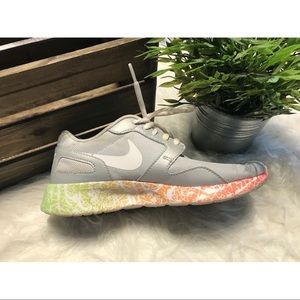 Gray Nike Sneakers with Multi-Colored Soles